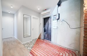 Apartment with doorways before and after renovation.